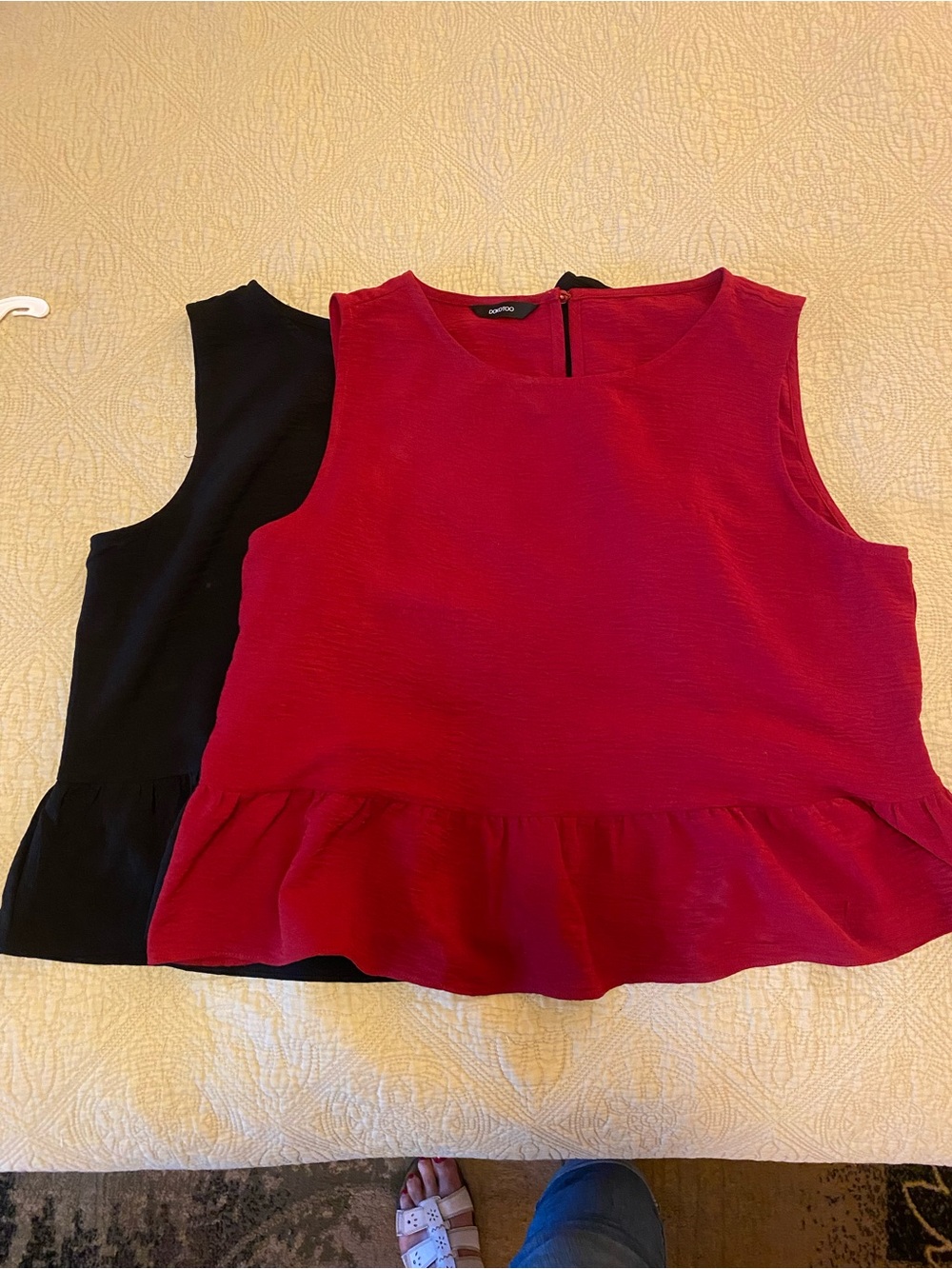 Bundle of Two Sleeveless Peplum Tops